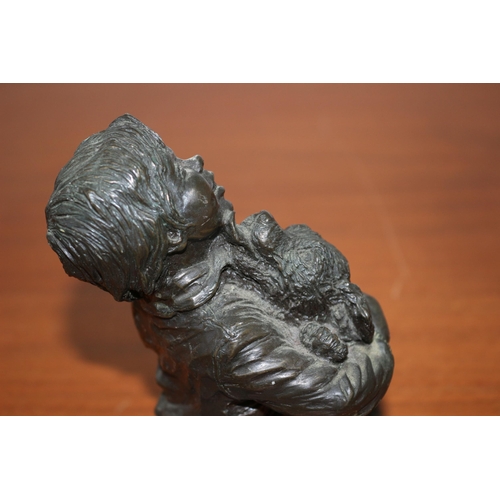 82 - Bronzed Spelter  Dog and Boy statue. 15 cm