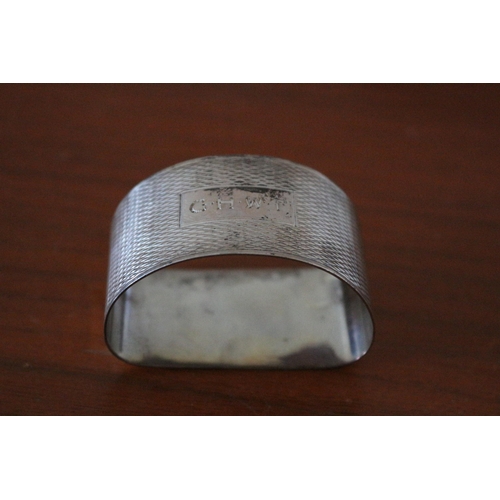 49 - Silver Hallmarked Napkin Ring - 19.2g plus an Indian Design White Metal Napkin Ring