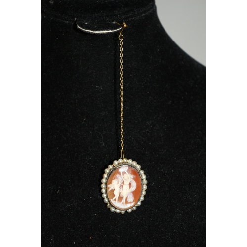 70 - Tested as Silver Setting with Well Carved Cameo Inset and Pearl Surround on Safety Chain and Pin