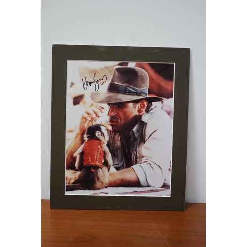 210 - Mounted Autographed Photo of Harrison Ford with Certificate of Authenticity