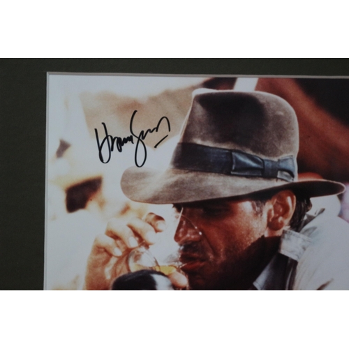 210 - Mounted Autographed Photo of Harrison Ford with Certificate of Authenticity