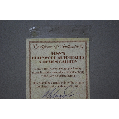 210 - Mounted Autographed Photo of Harrison Ford with Certificate of Authenticity