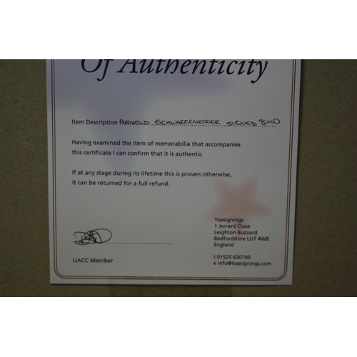 214 - Mounted Autographed Photo of Arnold Schwarzenegger with Certificate of Authenticity