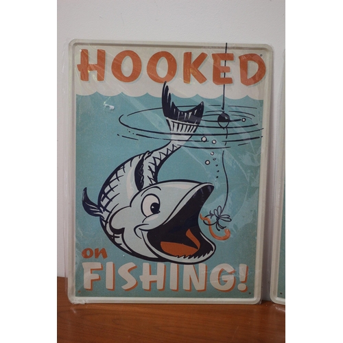 51 - 2 x Hooked on Fishing Tin Signs