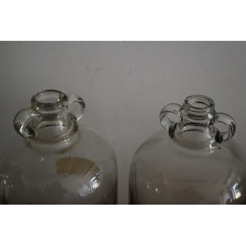 103 - 2 x Glass Demijohn Jugs with Twin Finger Handles