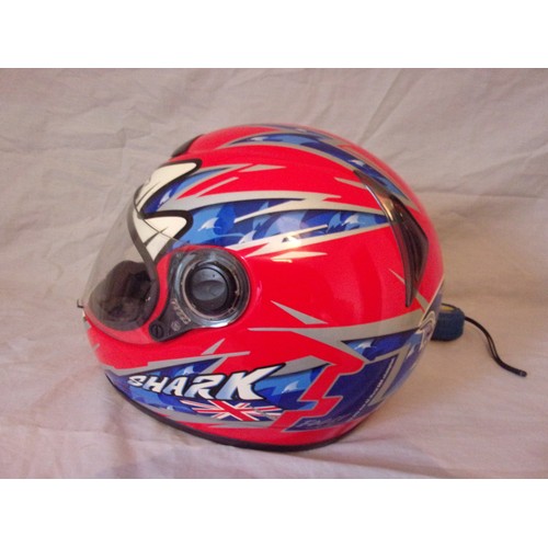 114 - A Used Carl Fogarty motogp crash helmet with dust bag