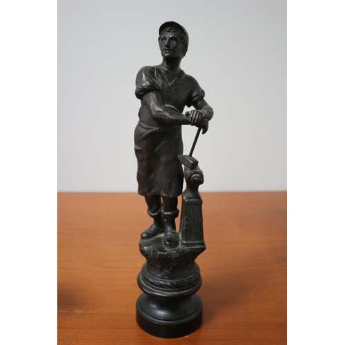 103 - Spelter/Metal Blacksmith with Anvil Statue 39cm