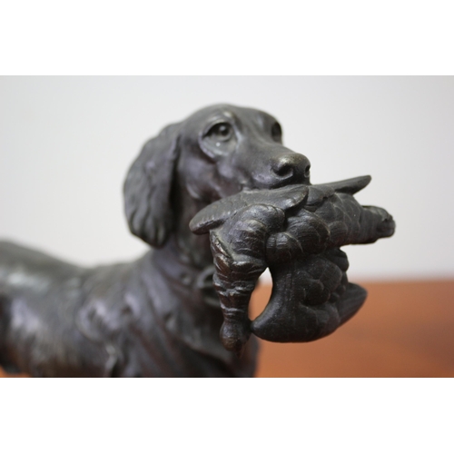 106 - Heavy Spelter / Metal Hunting Dog with Bird in Mouth 28cm tall- 36cm width