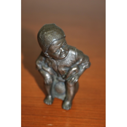 109 - Spelter / Metal Boy Sitting on a Potty 10cm