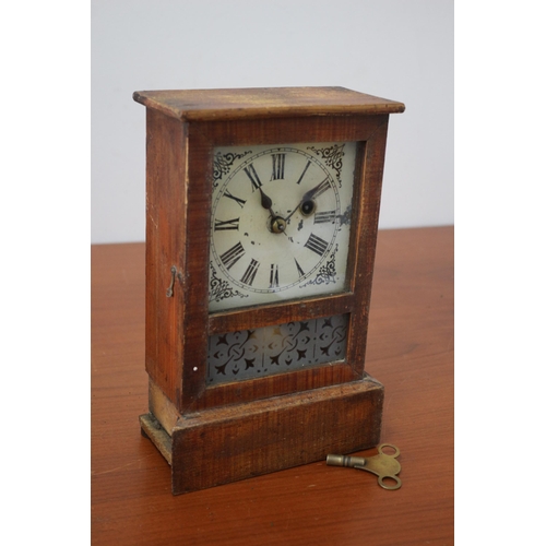 175 - Vintage Wooden cased Mantle Clock with Decorative Glass Front plus Pendulum and Key - 26 x 17cm