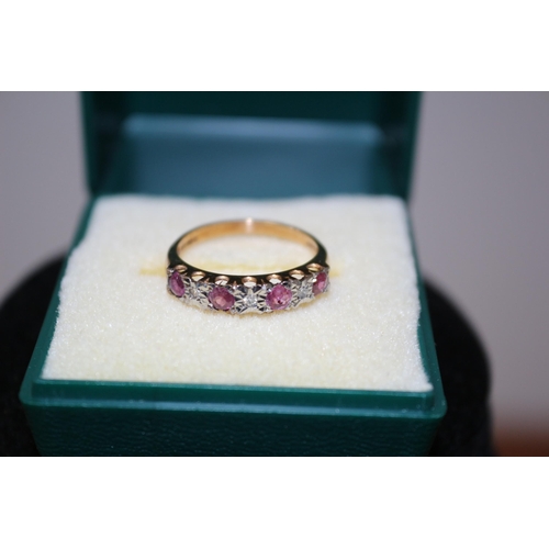 181 - 9ct Yellow Gold Hallmarked Ring with Diamonds and Ruby's - Size L