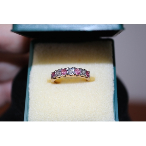 181 - 9ct Yellow Gold Hallmarked Ring with Diamonds and Ruby's - Size L