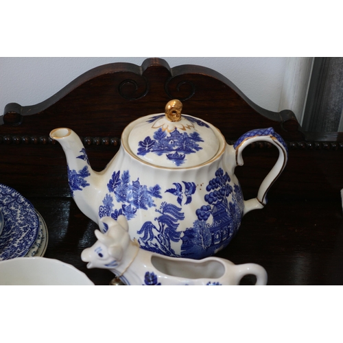 19 - Selection of Blue and White Willow Pattern Crockery including a Sadler Teapot