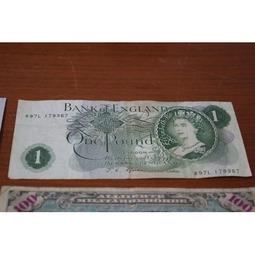 41 - 10 Shilling Note, 2 x £1 notes plus Foreign notes of age