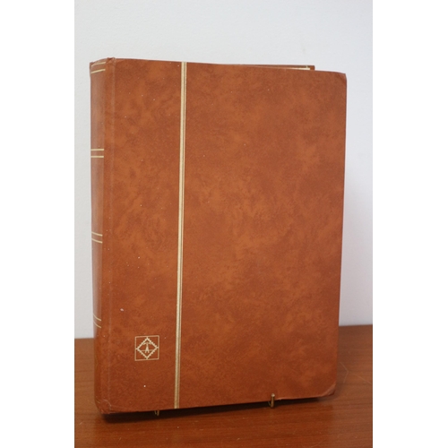 45 - Stamp Album containing large quantity of Stamps