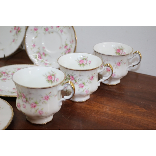 325 - Paragon Victoriana Rose 10 Pieces (one saucer repaired)