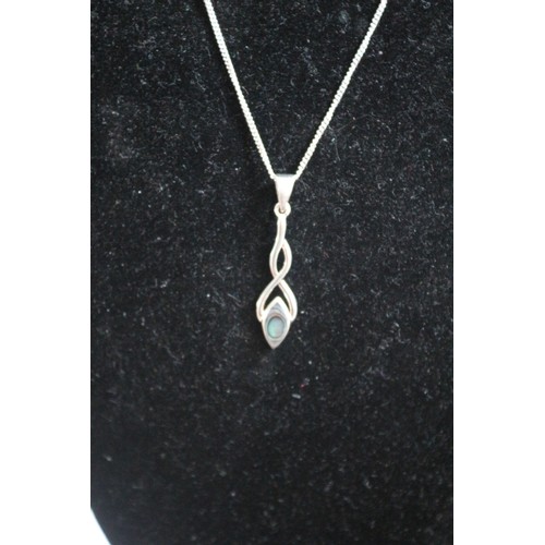 46 - Sterling Silver Pendant Necklace with Blue Centrepiece on Silver Chain