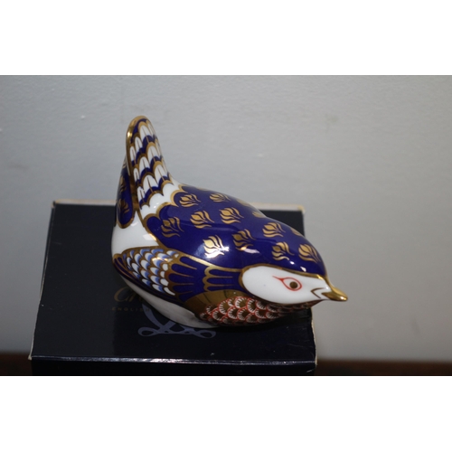 19 - Royal Crown Derby Paperweight boxed with stopper 
Bird-  Navy coloured with scalloped feathers