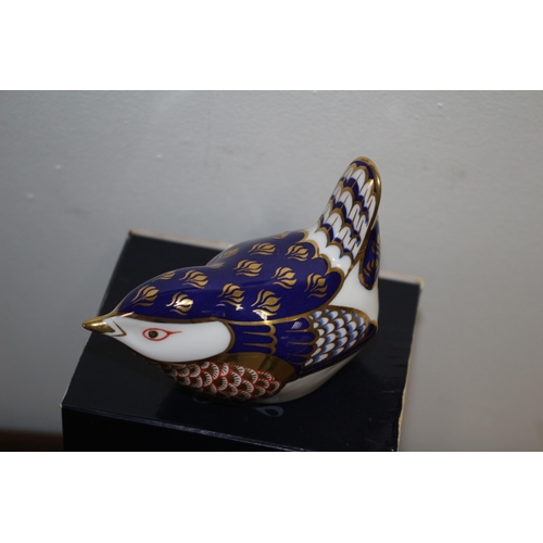 19 - Royal Crown Derby Paperweight boxed with stopper 
Bird-  Navy coloured with scalloped feathers