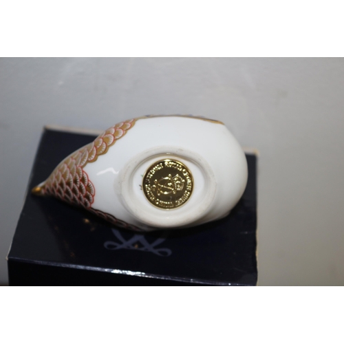 19 - Royal Crown Derby Paperweight boxed with stopper 
Bird-  Navy coloured with scalloped feathers