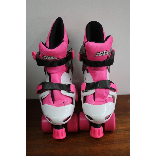 53 - No Fear Pink Roller Skates