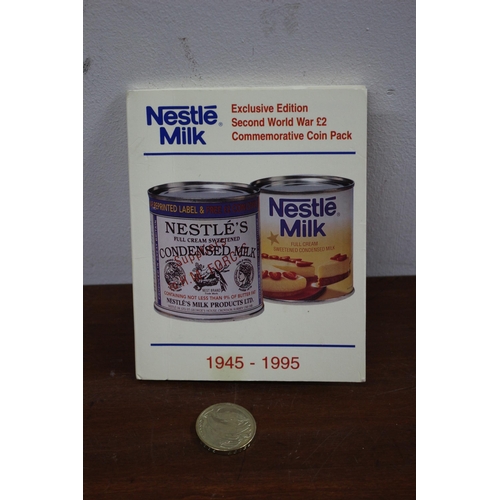 22 - Nestle Milk Commemorative WW2 x 2 £2 Coins, one with Card Pack