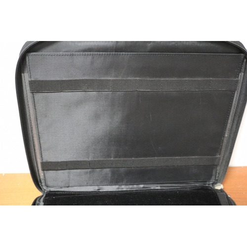 9 - Pen Display Folder Case 
Wear on zips