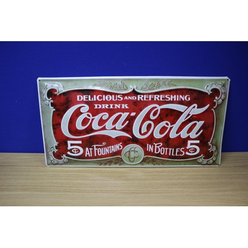 131 - Metal Coca Cola Pressed Tin Sign
49cm wide