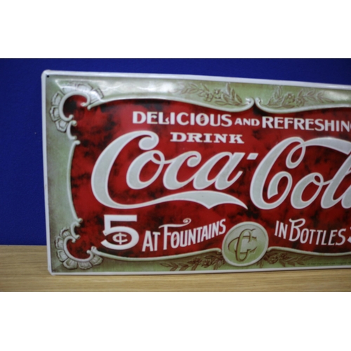 131 - Metal Coca Cola Pressed Tin Sign
49cm wide