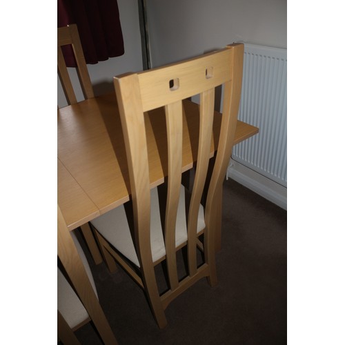 220 - Wooden Extending Dining Table & 4 Chairs 
When Extended the Table is 18 long x 90 wide x 76 high