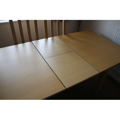 220 - Wooden Extending Dining Table & 4 Chairs 
When Extended the Table is 18 long x 90 wide x 76 high