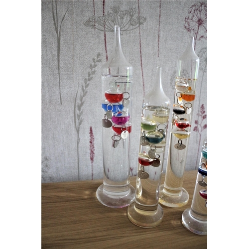 227 - 4 x Decorative Glass Galileo Thermometer 
Tallest is 29cm High