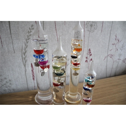 227 - 4 x Decorative Glass Galileo Thermometer 
Tallest is 29cm High