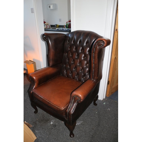 33 - Chesterfield Style Wing Back, Brown Leather Chair with Queen Anne Style Feet, small tear on one side