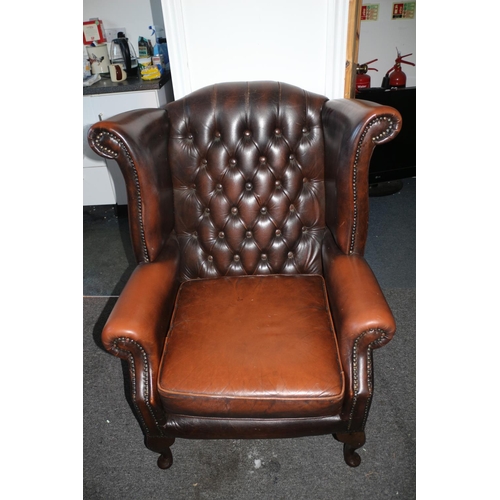 33 - Chesterfield Style Wing Back, Brown Leather Chair with Queen Anne Style Feet, small tear on one side