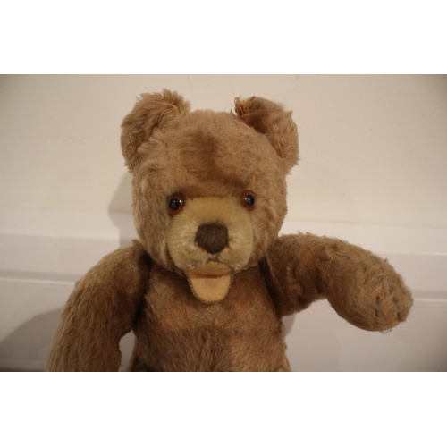 52 - Aged Teddy Bear with Jointed Arms, Approximately 23cm Tall whilst sitting