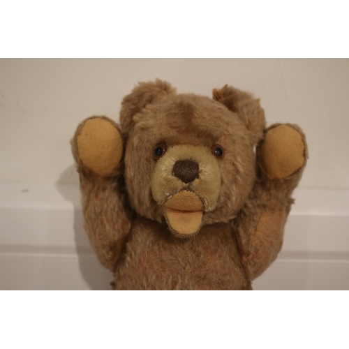 52 - Aged Teddy Bear with Jointed Arms, Approximately 23cm Tall whilst sitting