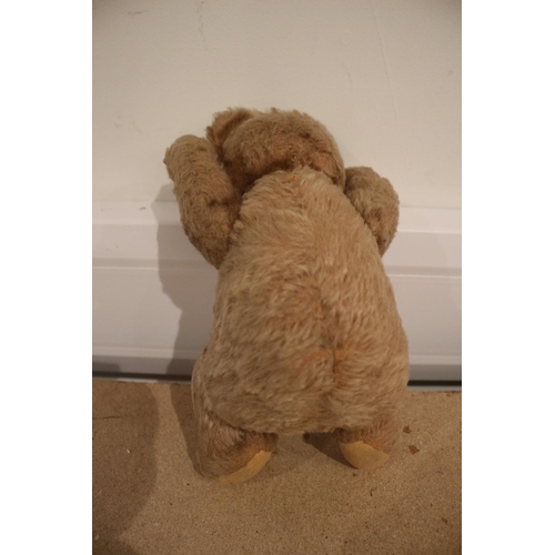 52 - Aged Teddy Bear with Jointed Arms, Approximately 23cm Tall whilst sitting