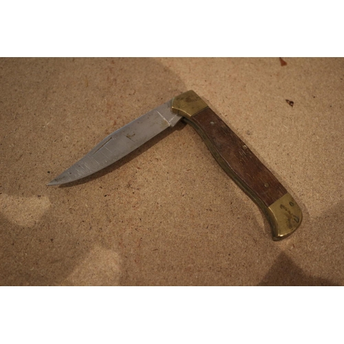 55 - Brass Handled Oak Knife