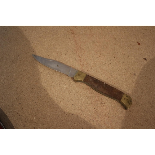 55 - Brass Handled Oak Knife