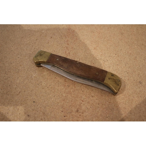 55 - Brass Handled Oak Knife