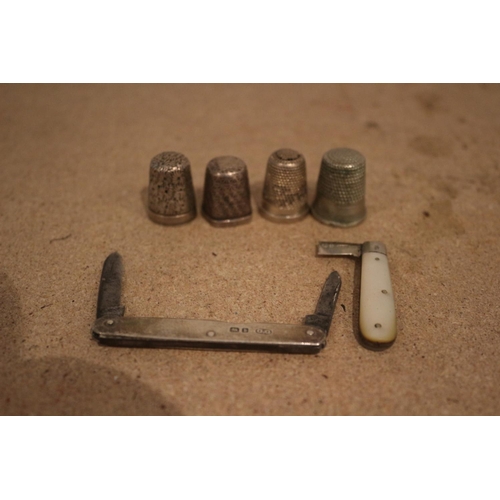 59 - 3 Silver Thimbles, One other & Silver Case Knife