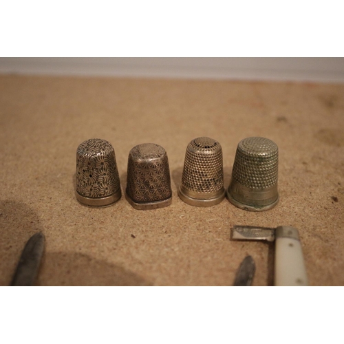 59 - 3 Silver Thimbles, One other & Silver Case Knife