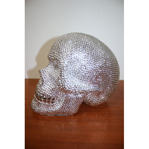 66 - Moulded Silver Skull