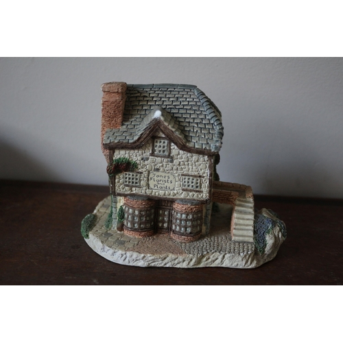 156 - Naturecraft 'Jones Florist' House Ornament, few nibbles, 13cm Wide