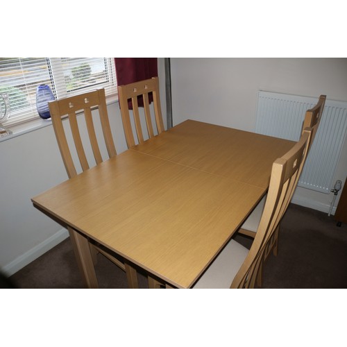 266 - Wooden Extending Dining Table & 4 Chairs 
When Extended the Table is 18 long x 90 wide x 76 high