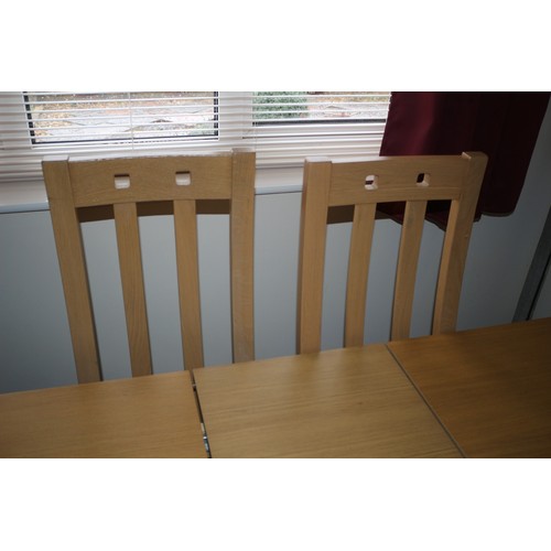 266 - Wooden Extending Dining Table & 4 Chairs 
When Extended the Table is 18 long x 90 wide x 76 high