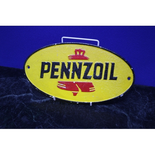 353 - Pennzoil Cast Iron Sign 
27cm Wide