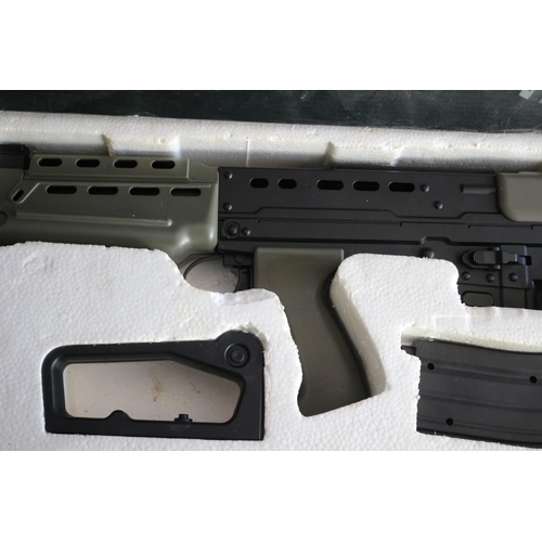 166 - L85A2 Airsoft 6mm Bullet Gun, Needs attention, rrp £429