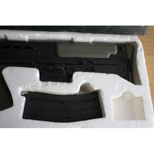 166 - L85A2 Airsoft 6mm Bullet Gun, Needs attention, rrp £429